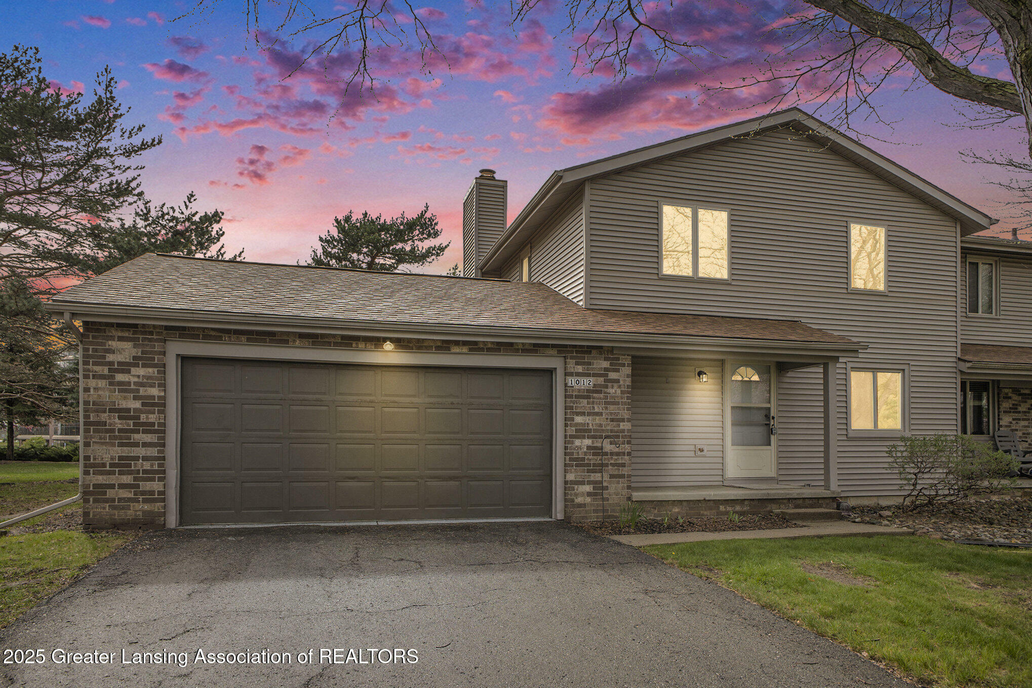 Property Photo: 1012 Grenoble Circle MI 48917