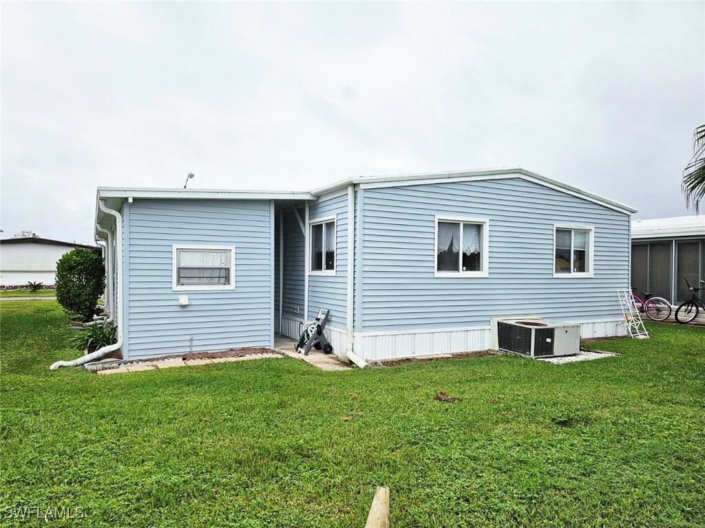 Property Photo: 102 Poinsettia Drive FL 33905