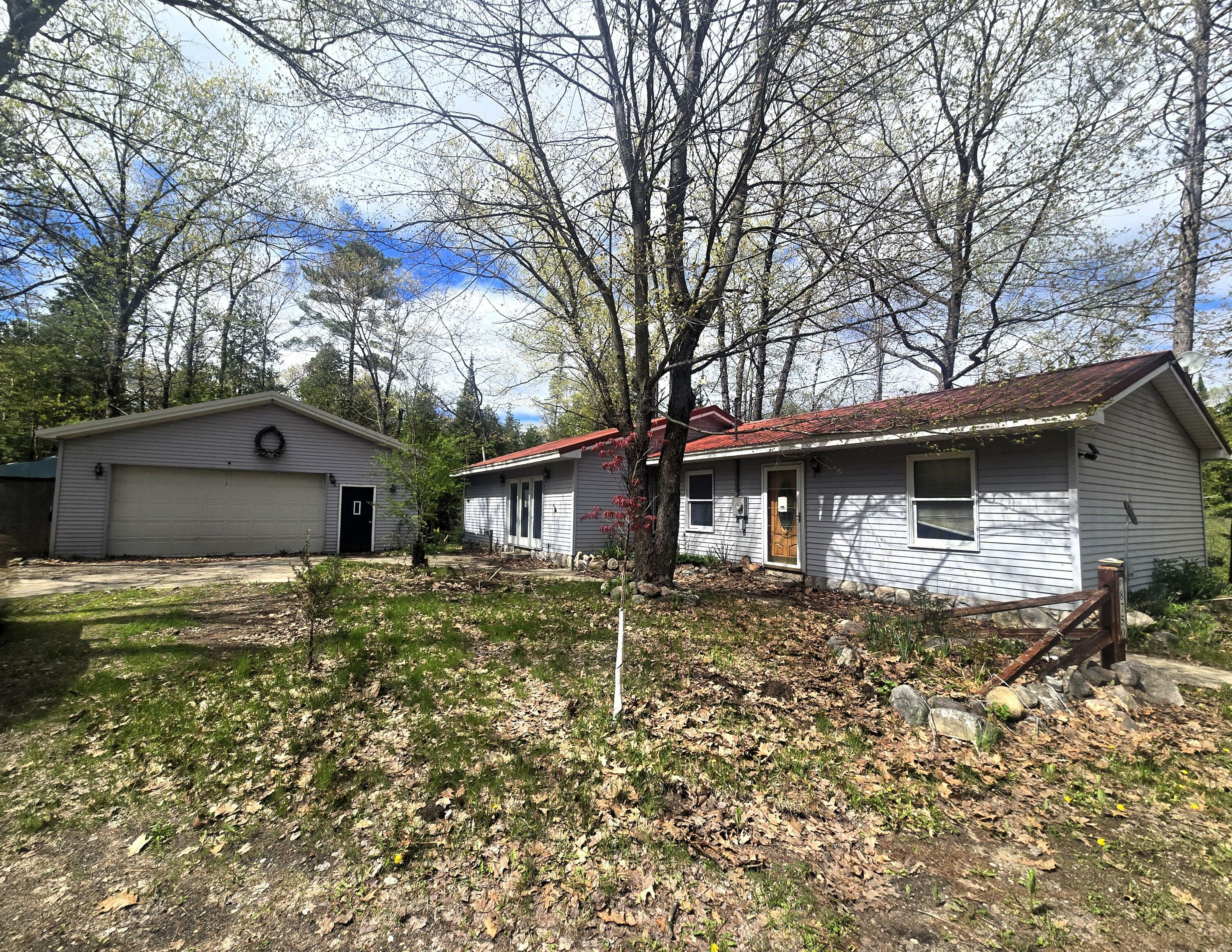 Property Photo: 8750 White Pine Pass SE MI 49633