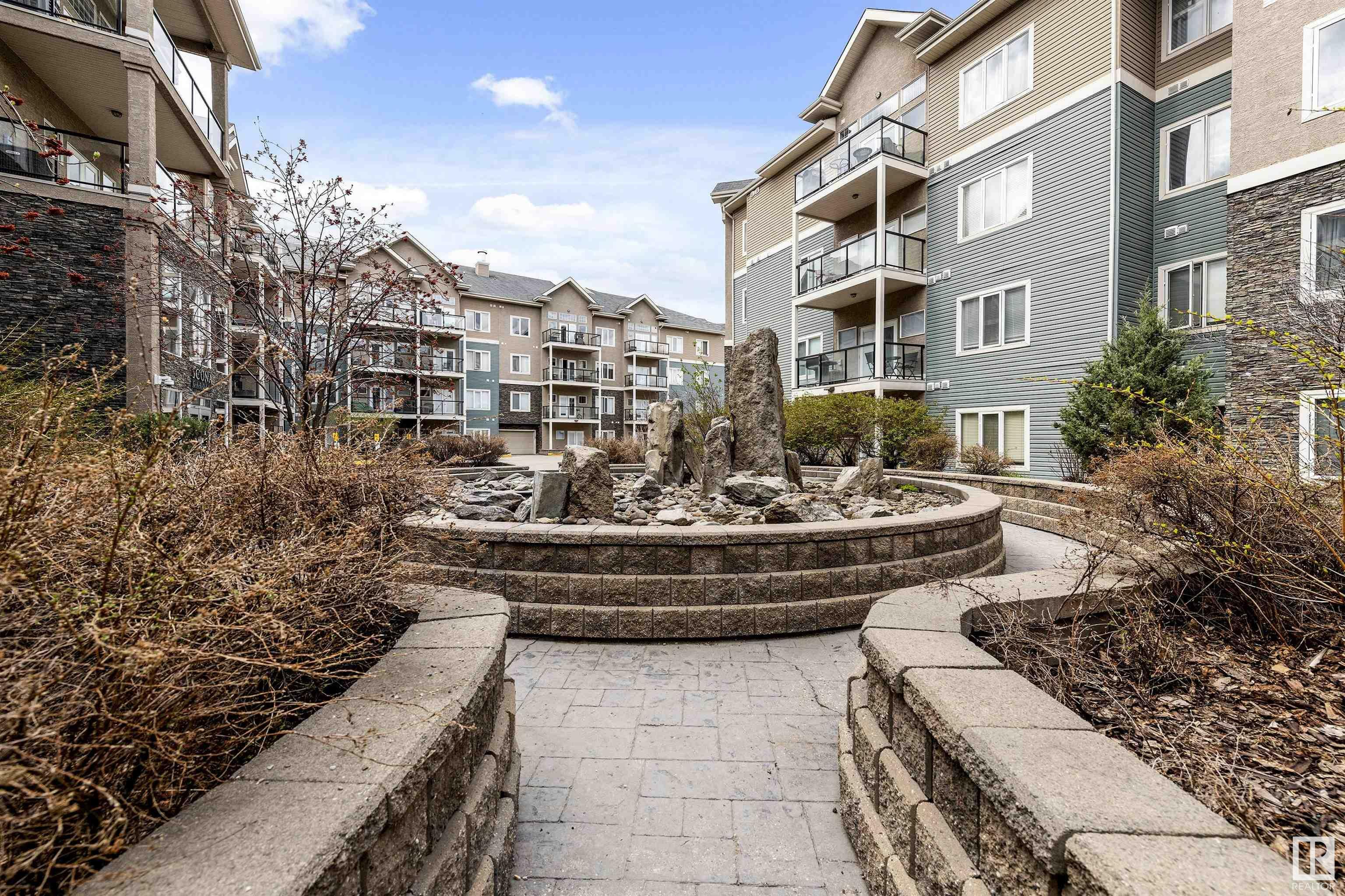 Property Photo: 10121 80 Avenue NW 128 AB T6E 0B9