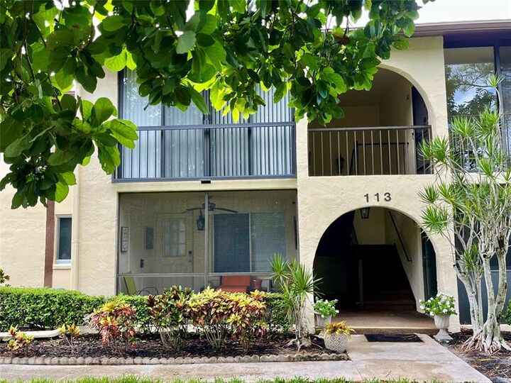 Property Photo:  113 Lake Pine Circle C-1  FL 33463
