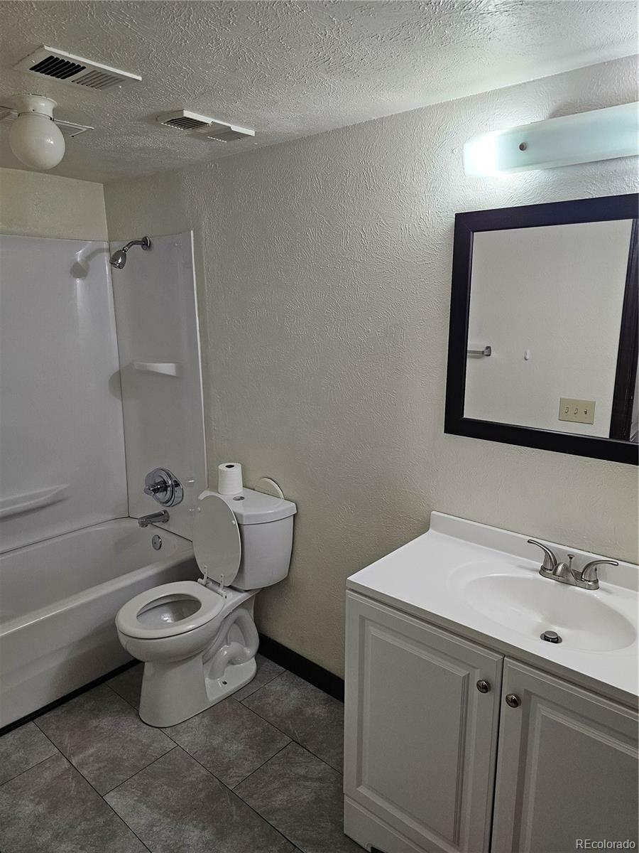 Property Photo: 7665 E Eastman Avenue 104A CO 80231