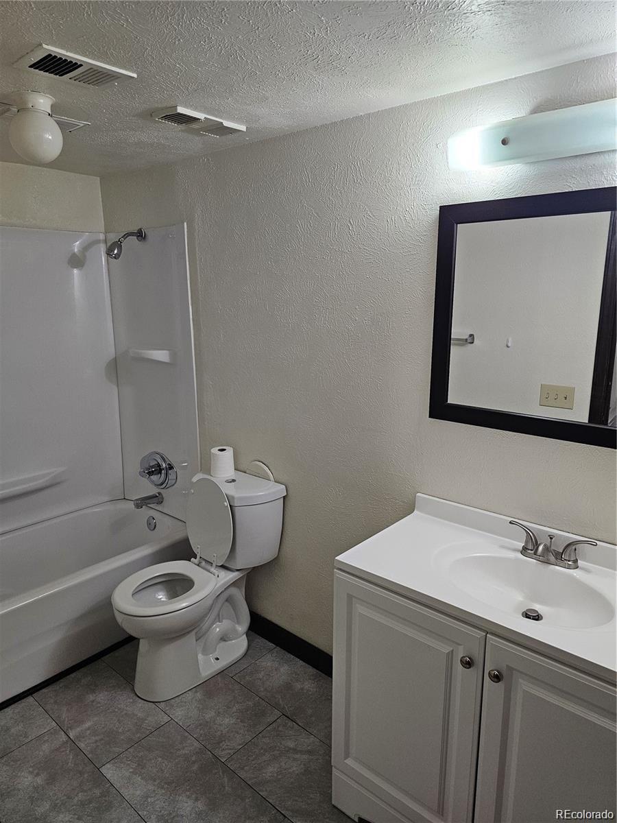 Property Photo: 7665 E Eastman Avenue 104A CO 80231