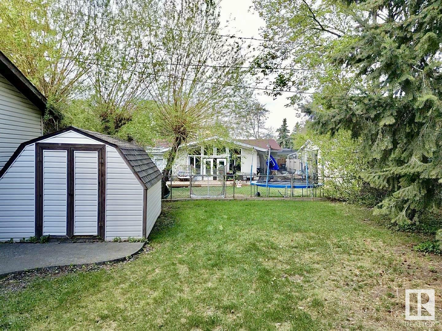 Property Photo: 228 Fir Street AB T8A 2A8
