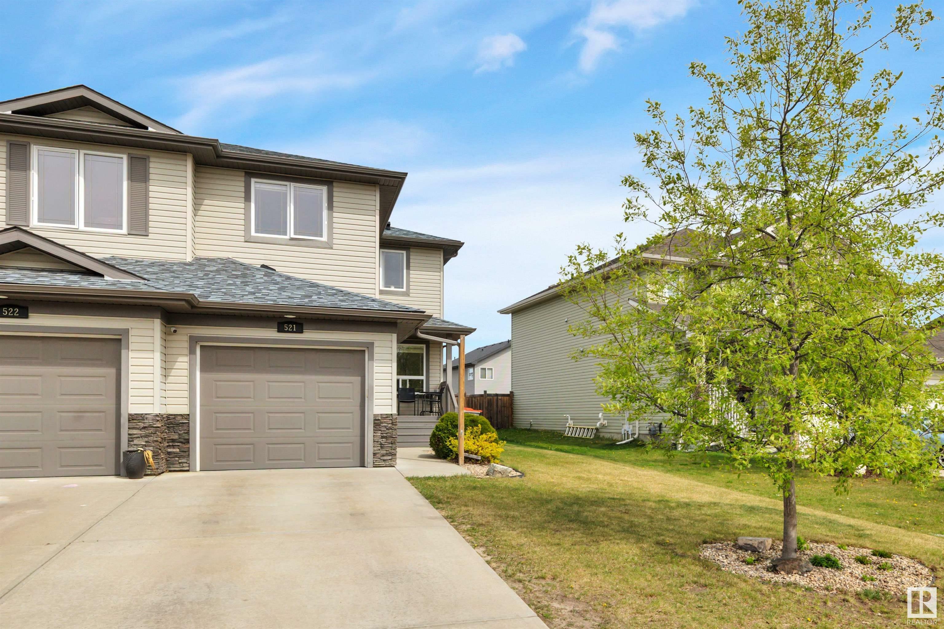 Property Photo: 521 Fairway Terrace AB T7Z 0G9