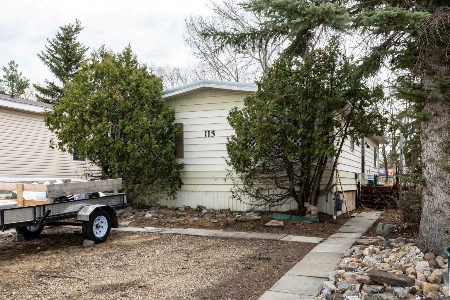 Property Photo: 113 Westwood Court AB T4G 1S2