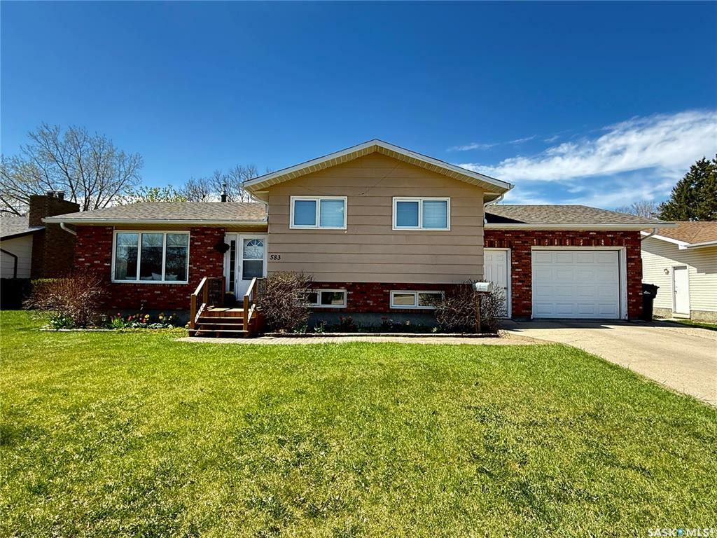 Property Photo: 583 13th Street N SK S4H 2Y4
