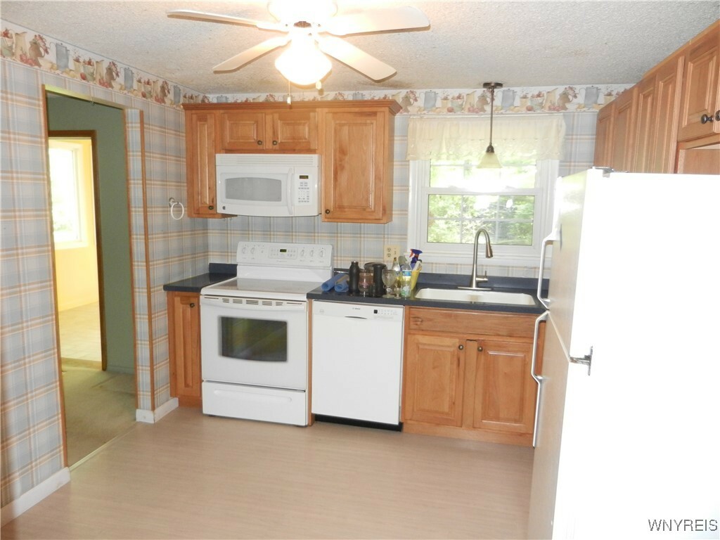 Property Photo: 5051 Overlook Point NY 14075