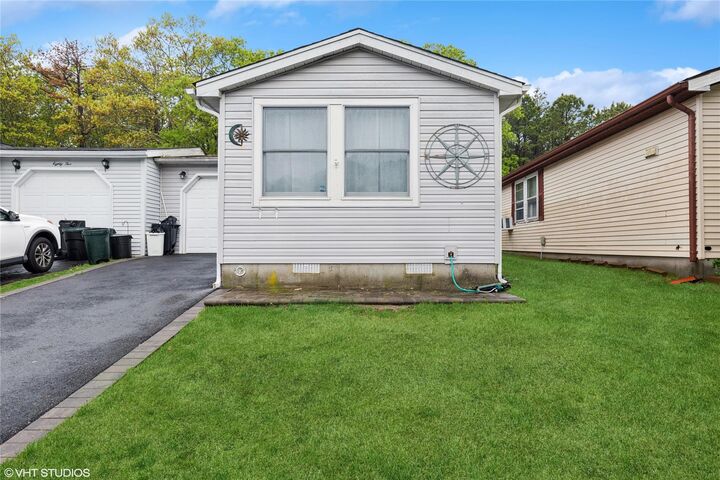 Property Photo: 87 Village Circle W NY 11949