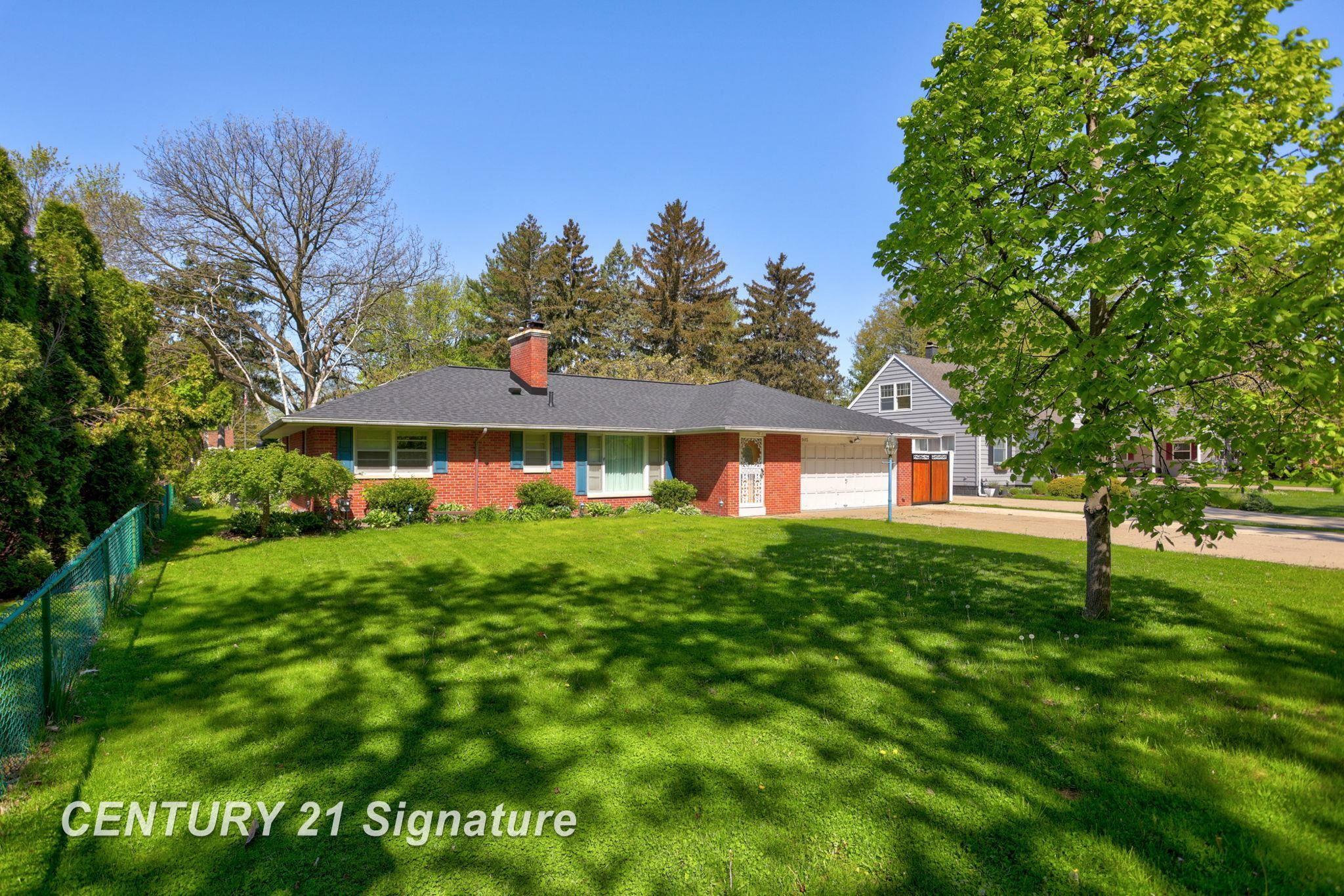 Property Photo:  1415 Coolidge Avenue  MI 48638 
