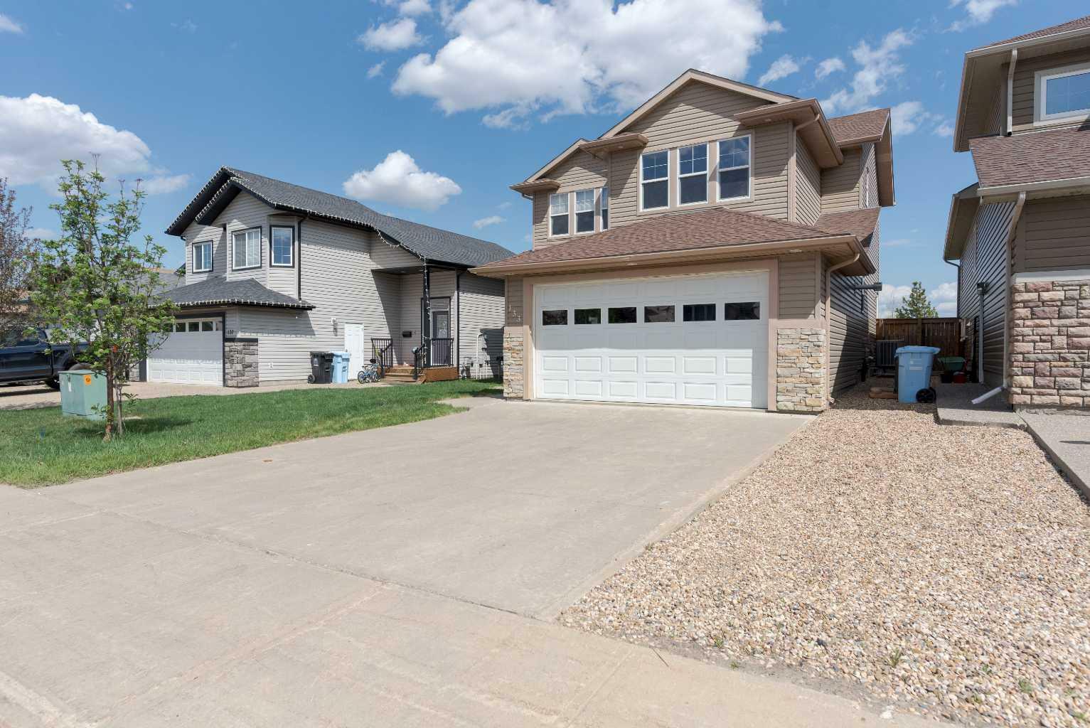 Property Photo: 133 Chestnut Way AB T9K 0M6