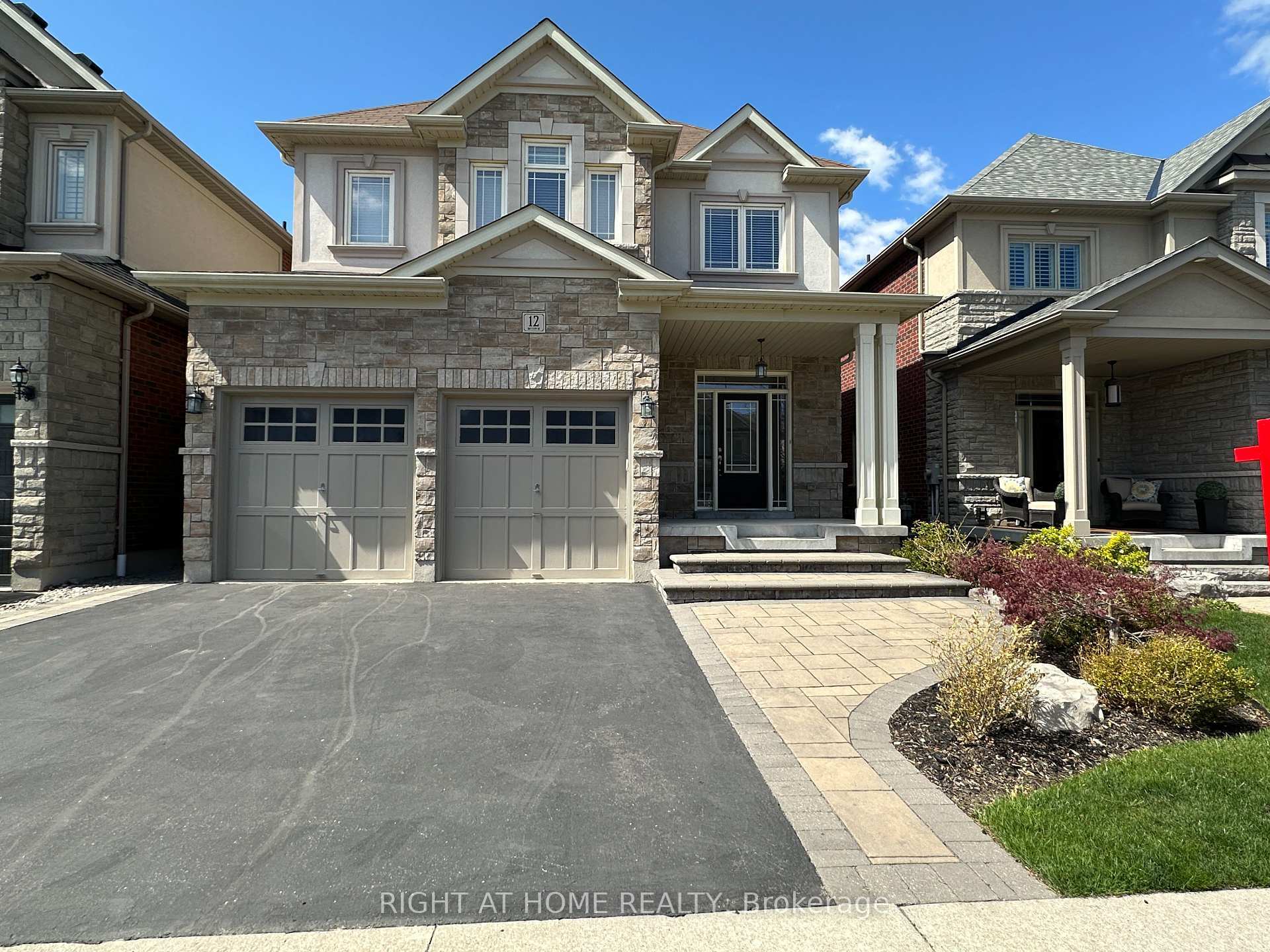 Property Photo: 12 Promenade Drive ON L1R 0L4