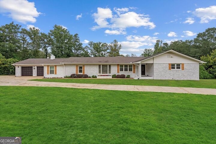 Property Photo:  2716 Georgia 16  GA 30116 