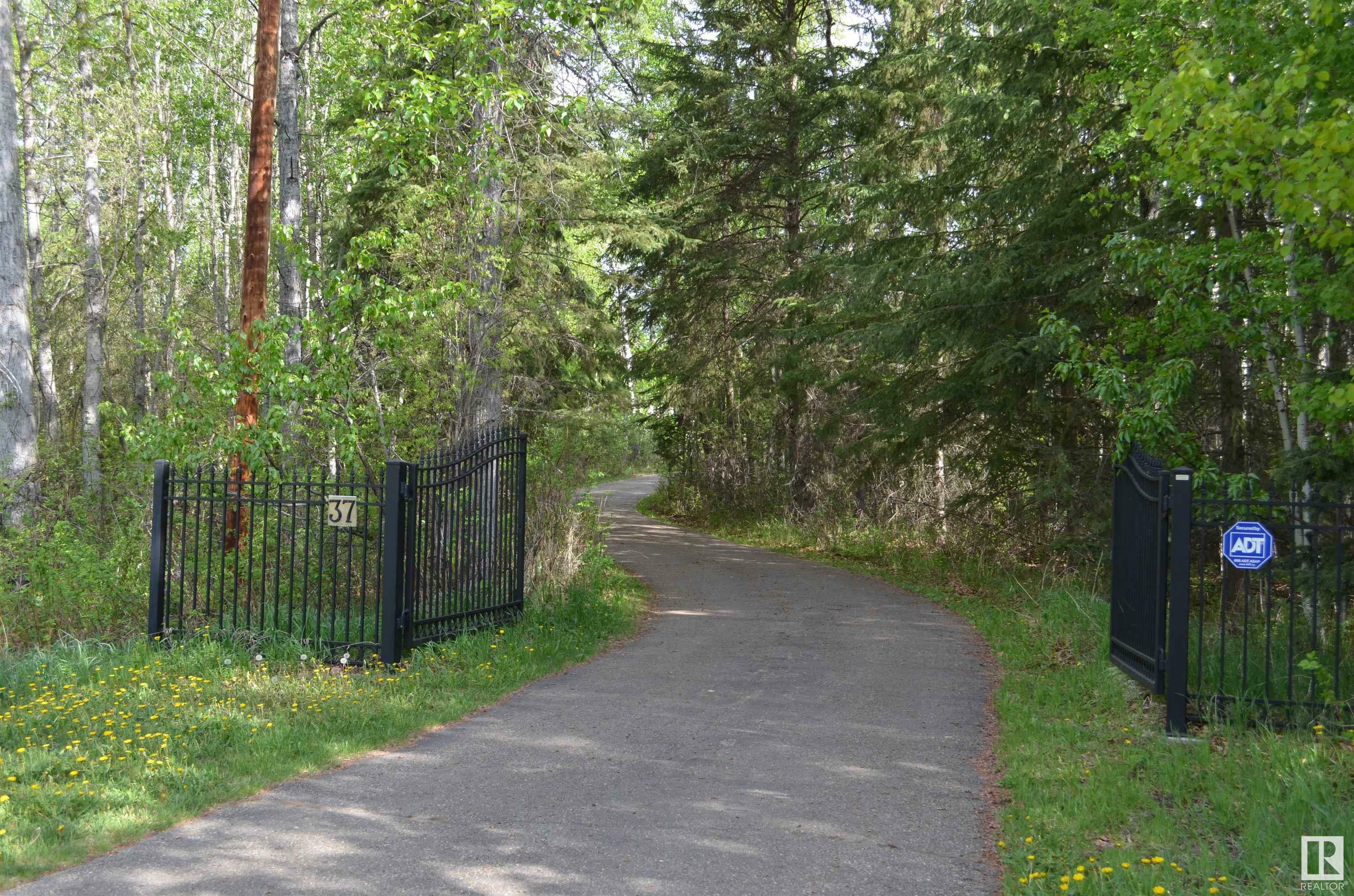 Property Photo: 51128 Rge Road 261 37 AB T7Y 1B8