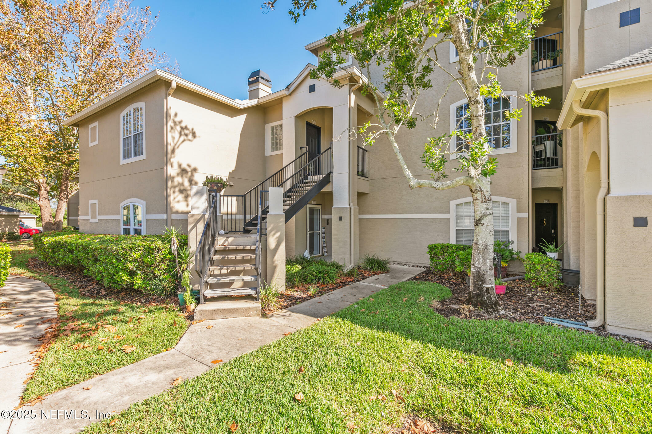 Property Photo: 1701 The Greens Way 1411 FL 32250