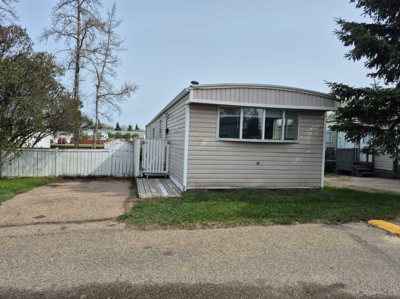 Property Photo: 6834 59 Avenue 208 AB T4P 1C9