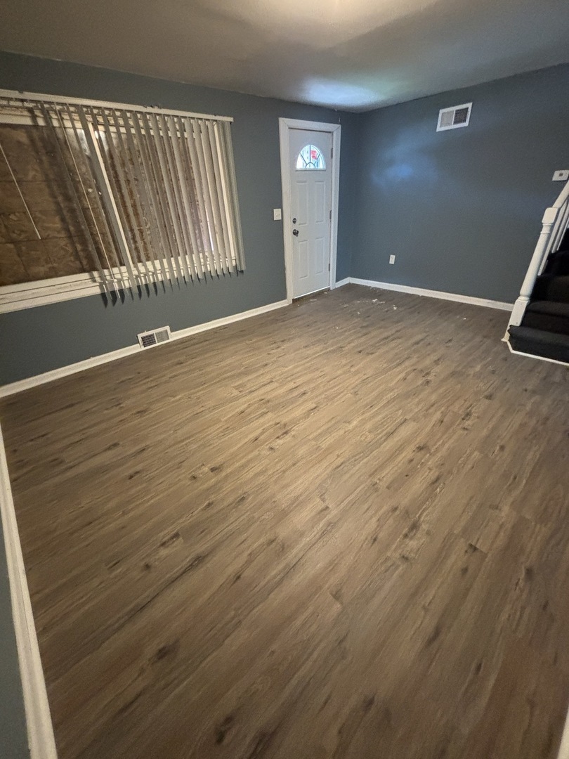 Property Photo: 9713 S Oglesby Avenue IL 60617