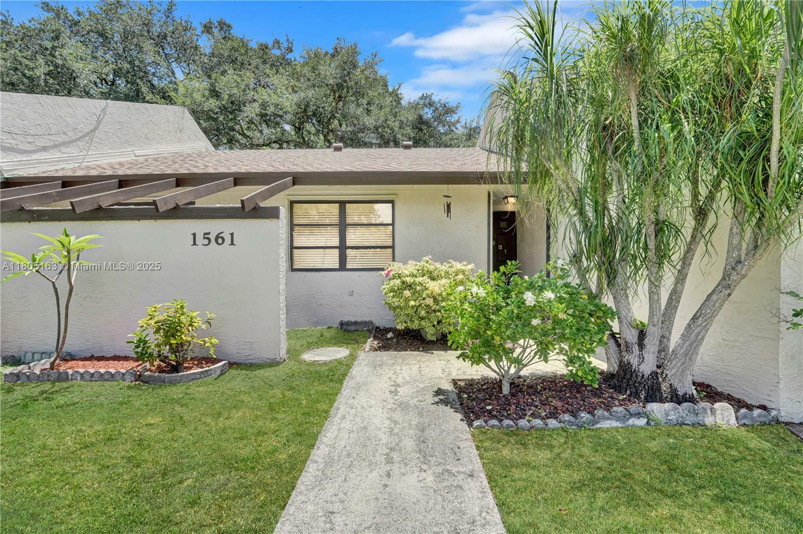 Property Photo: 1561 NW 98th Ter FL 33024