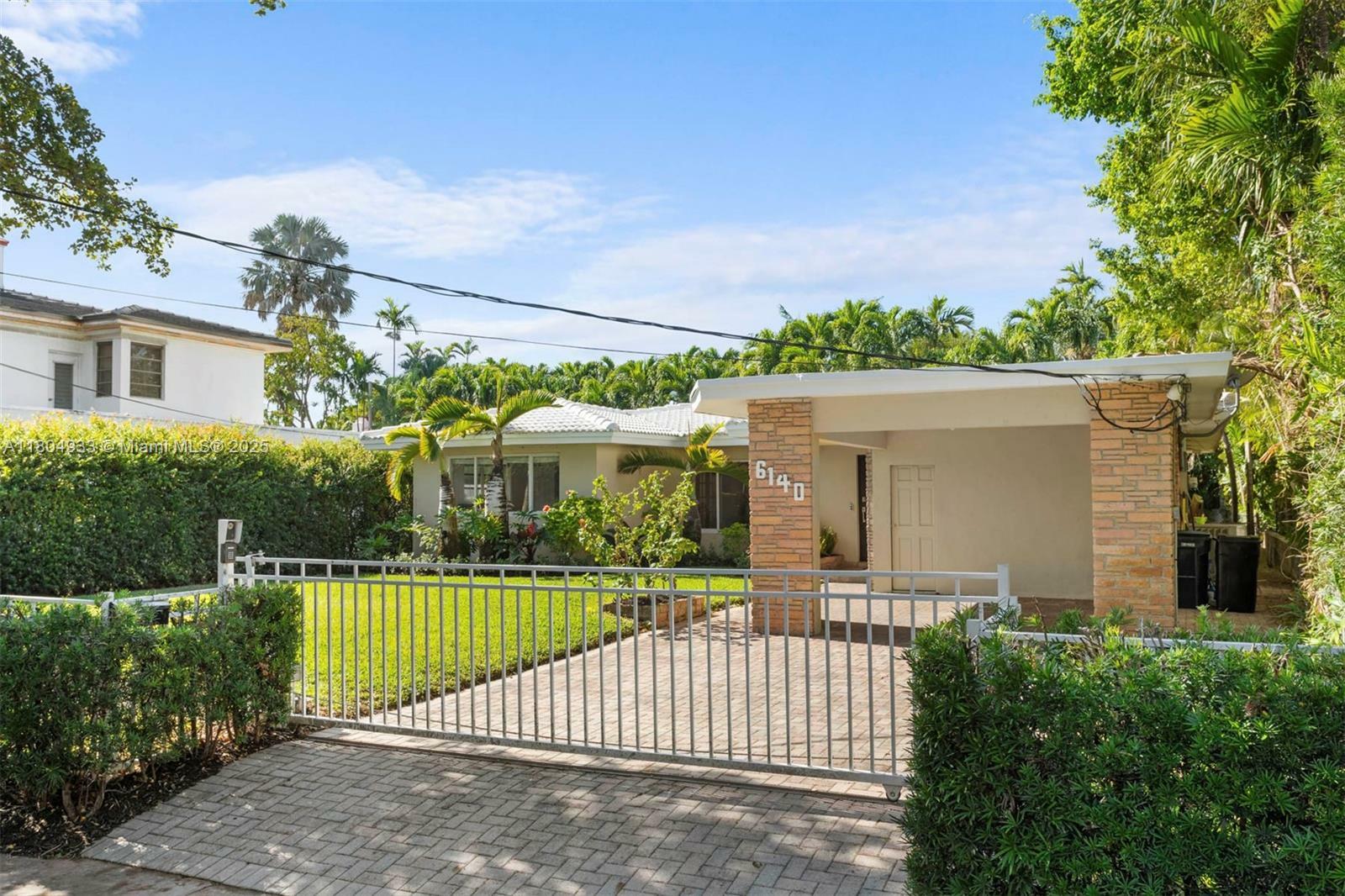 Property Photo: 6140 Pine Tree Dr FL 33140