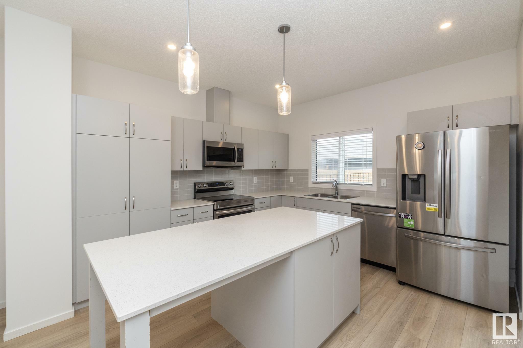 Property Photo: 1279 Rosenthal Boulevard NW AB T5T 7N7