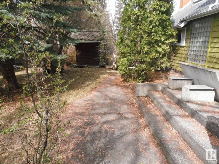 Property Photo: 3830 112 Avenue NW AB T5W 0M6