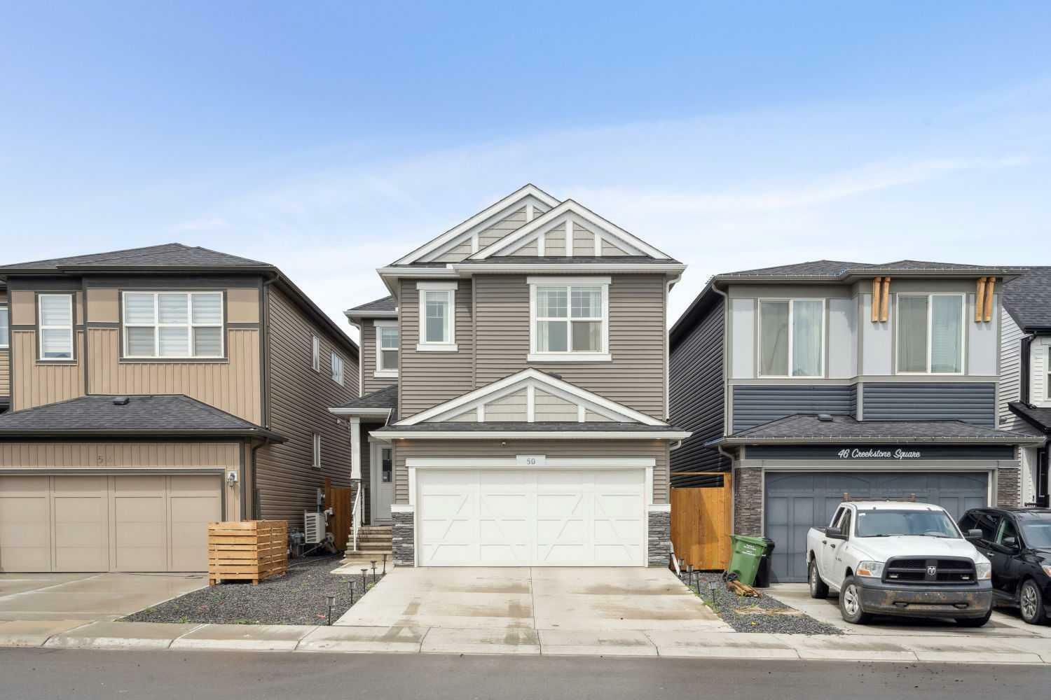Property Photo: 50 Creekstone Square SW AB T2X 4P6