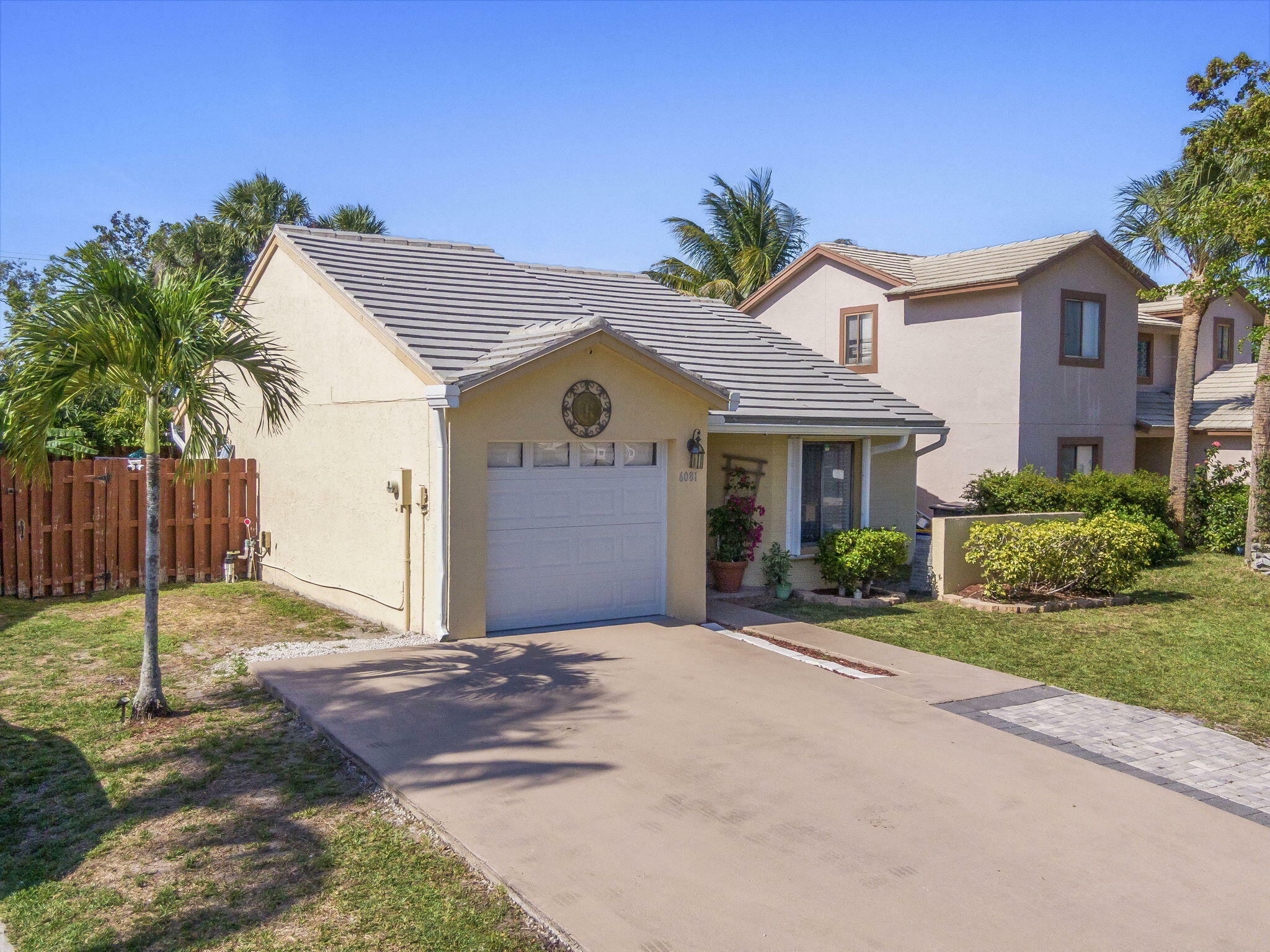 Property Photo:  6081 Strawberry Fields Way  FL 33463 