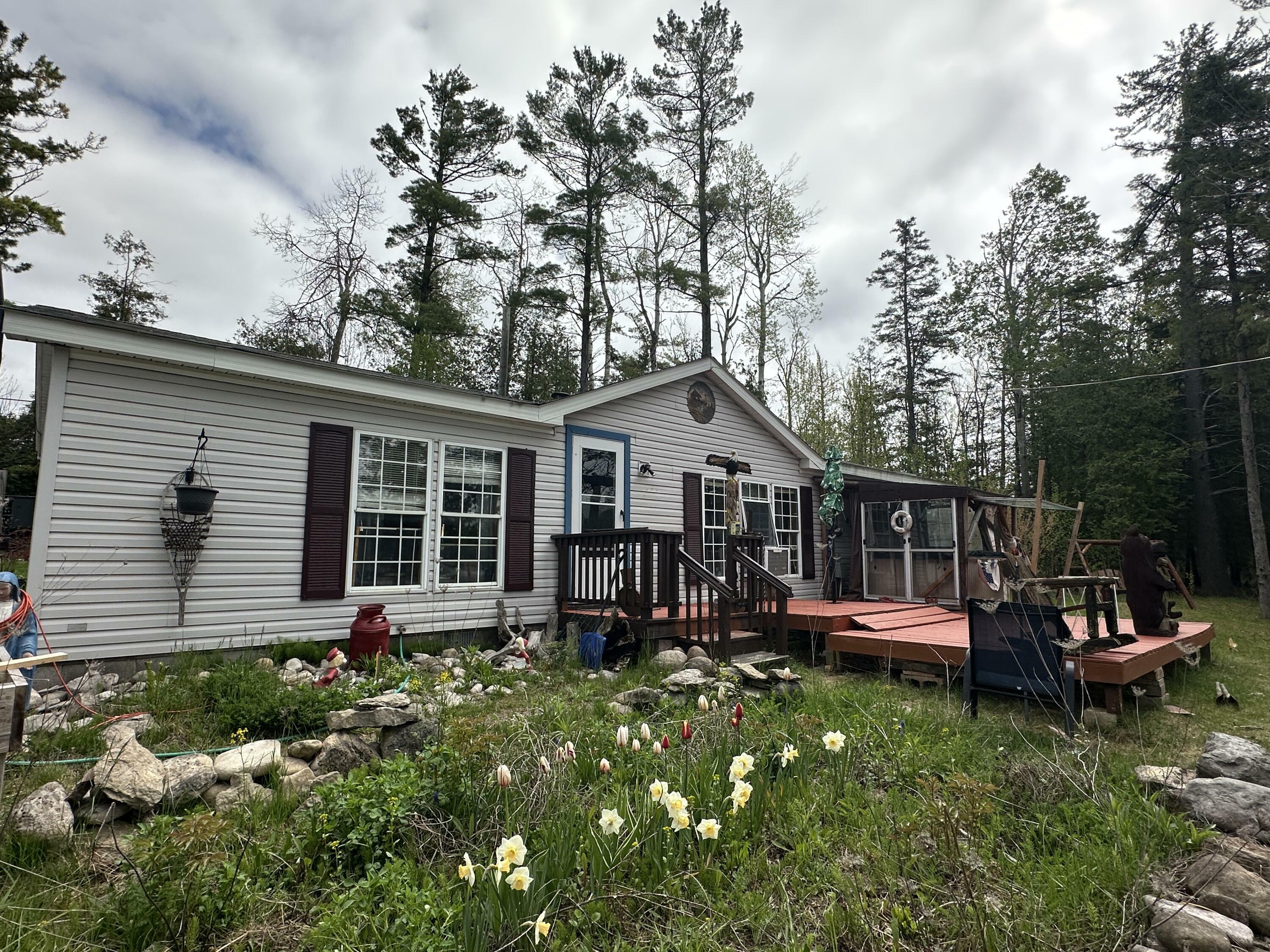 Property Photo: 3469 Long Rapids Road MI 49707