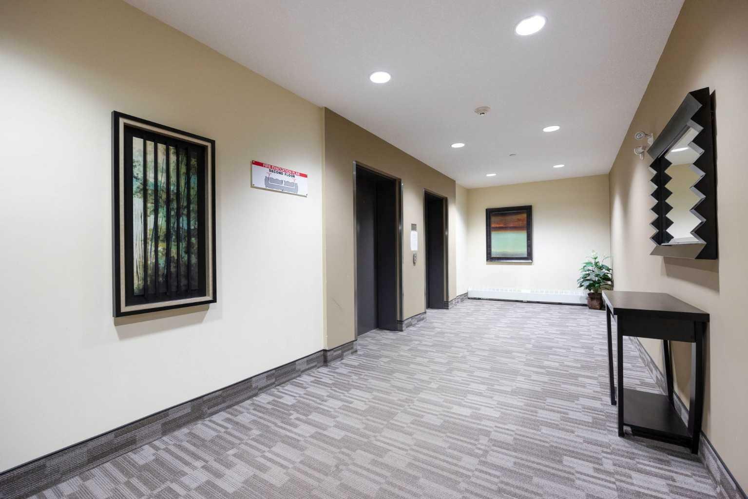 Property Photo: 135A Sandpiper Road 1209 AB T9K 0N8