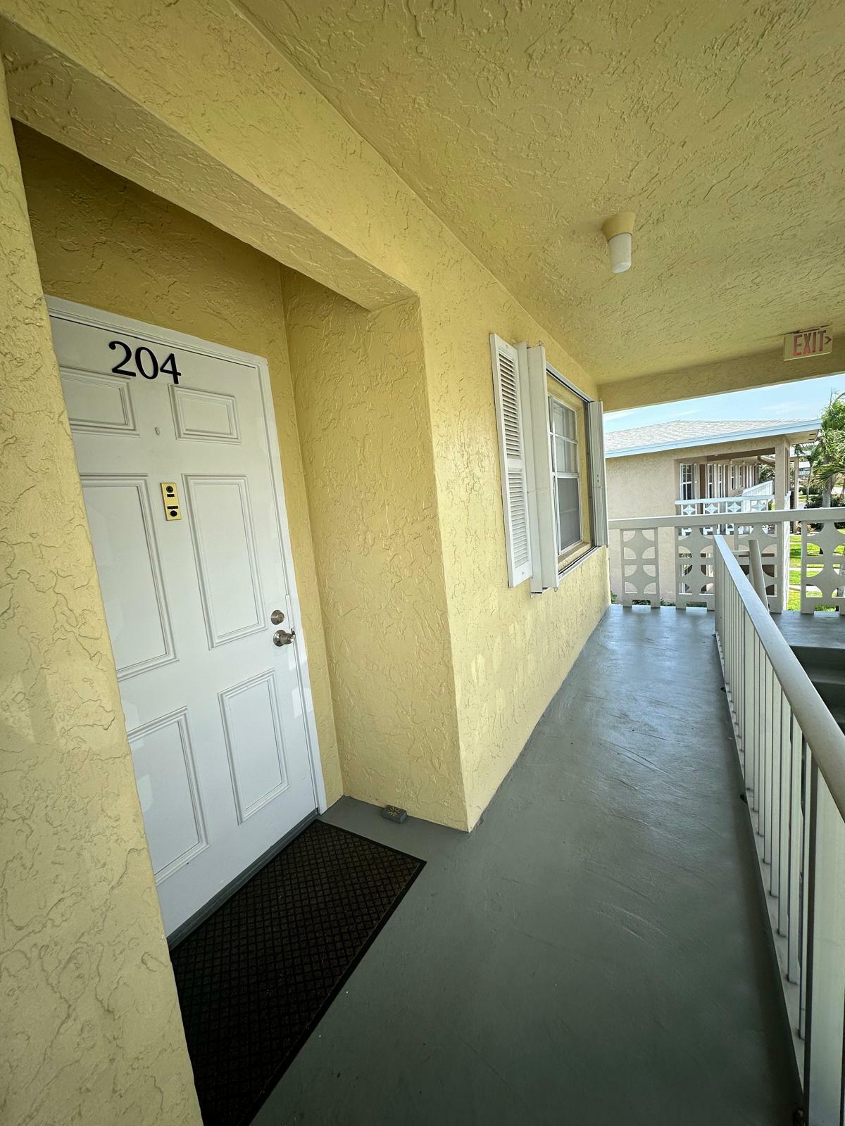 Property Photo: 1120 Mahogany Way 204 FL 33445