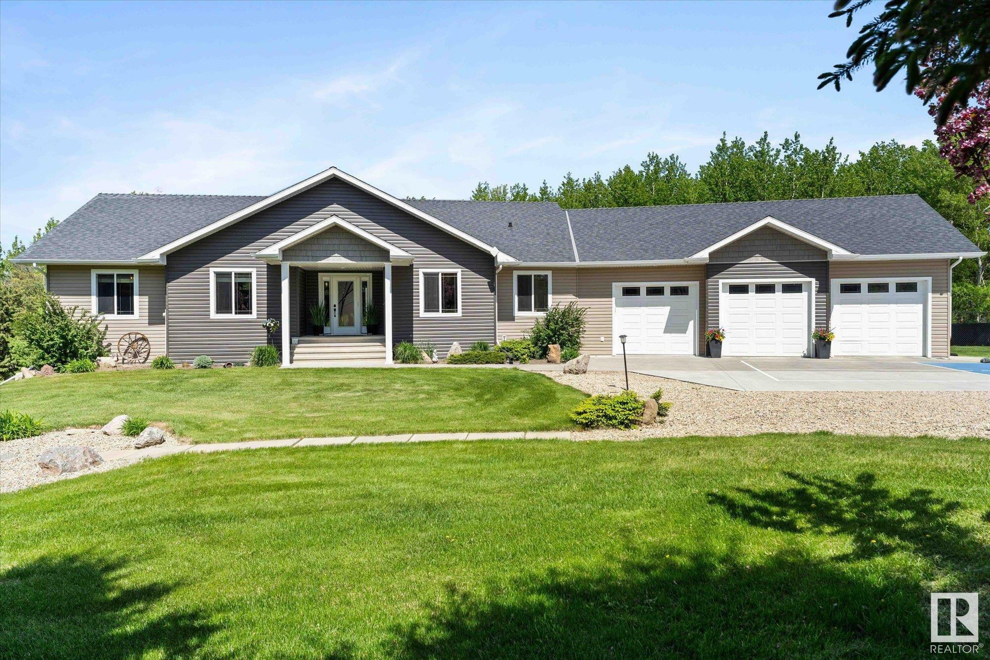 Property Photo: 53310 Rge Road 15 4C AB T7Y 0C3