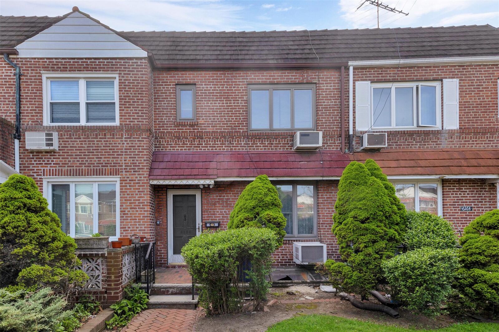 Property Photo:  61-66 80th Street  NY 11379 