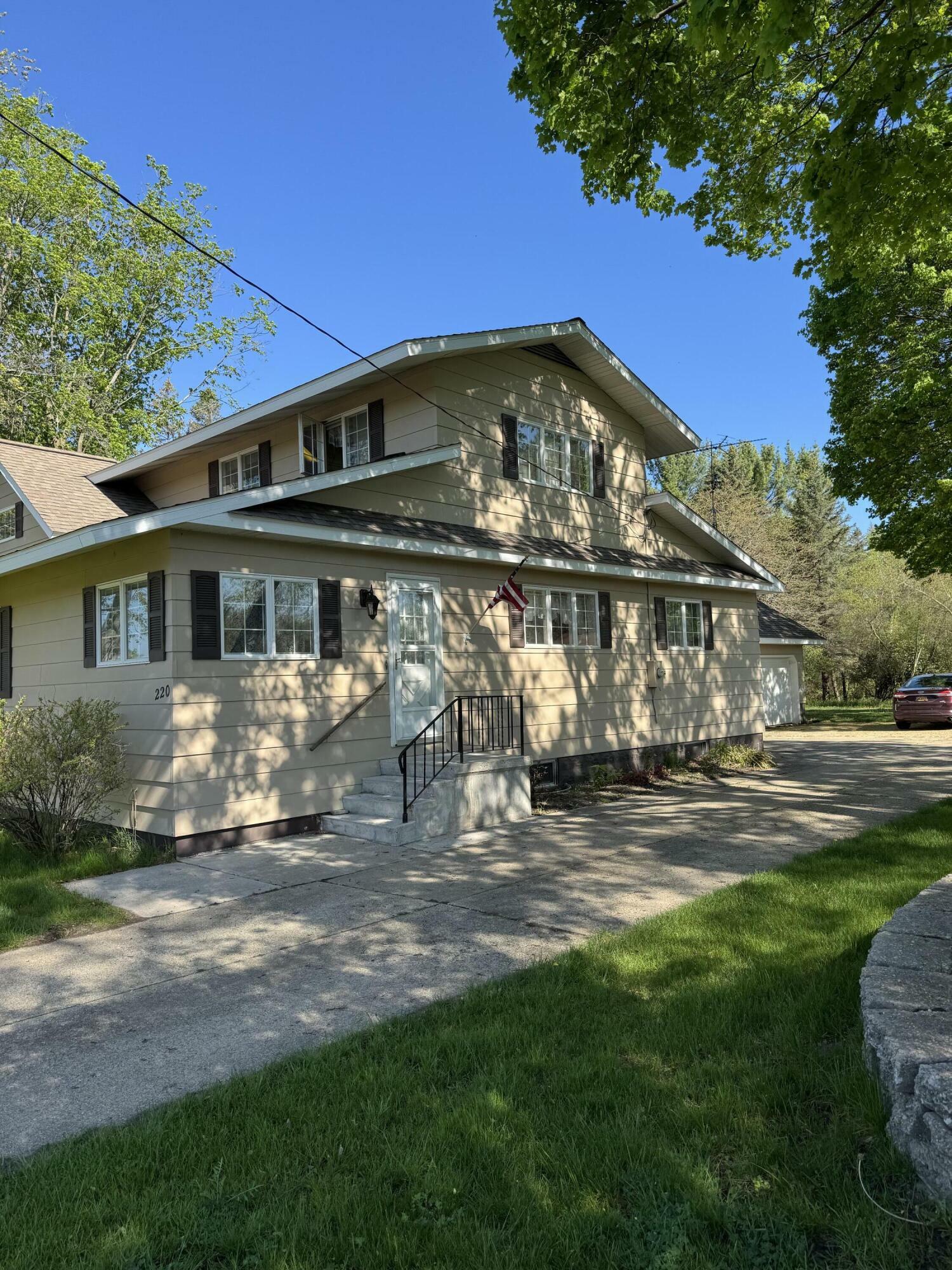 Property Photo: 220 E Preuss Road MI 49660
