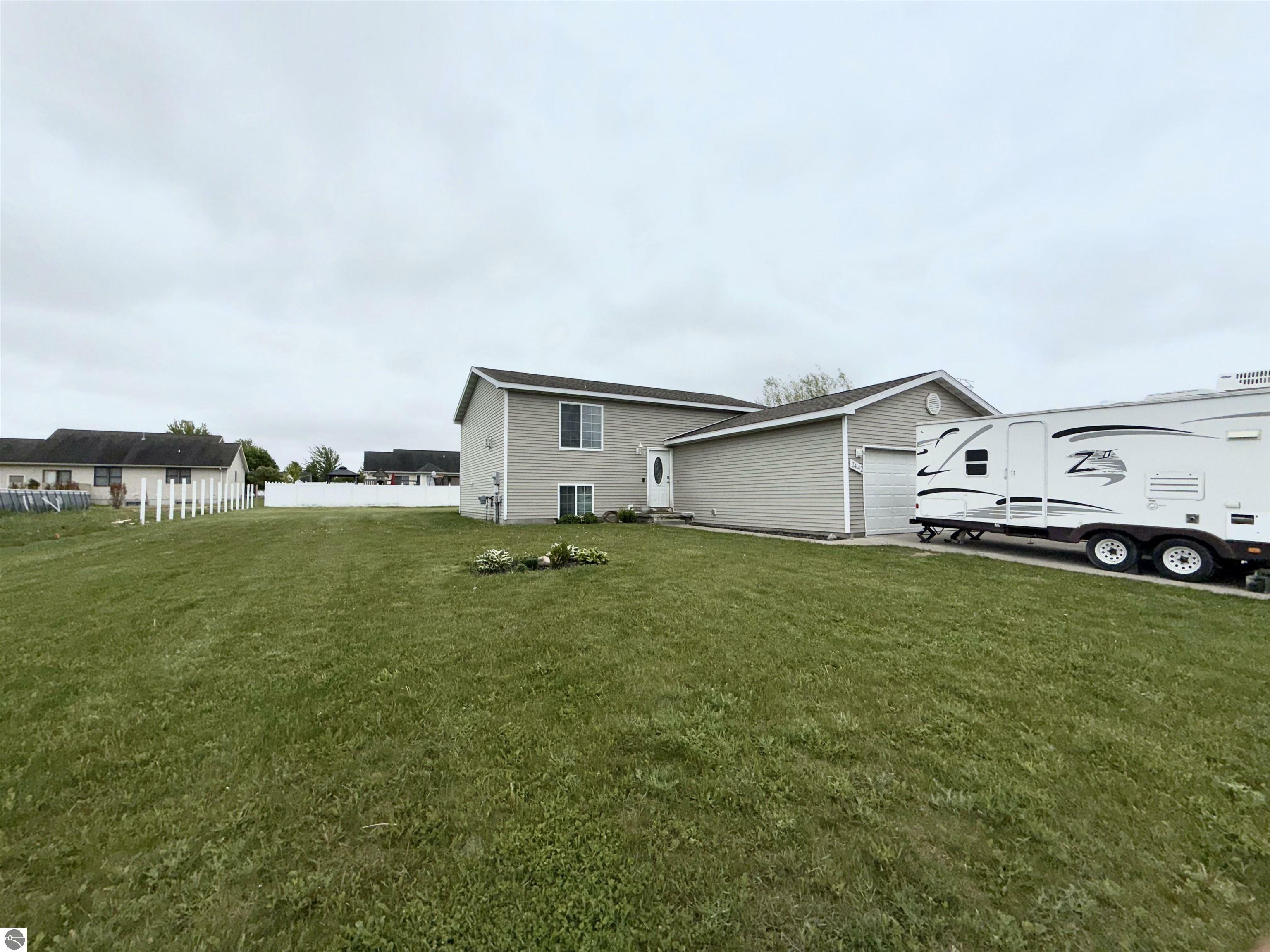 Property Photo:  2442 Joseph Drive  MI 48858 
