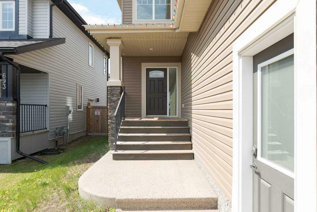 Property Photo: 689 Heritage Drive AB T9K 2X2