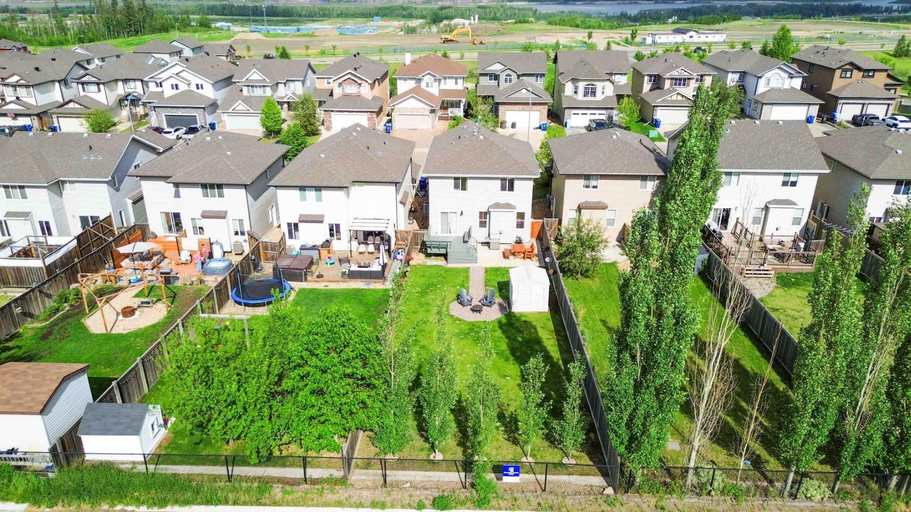 Property Photo: 124 Gravelstone Way AB T9K 0S8