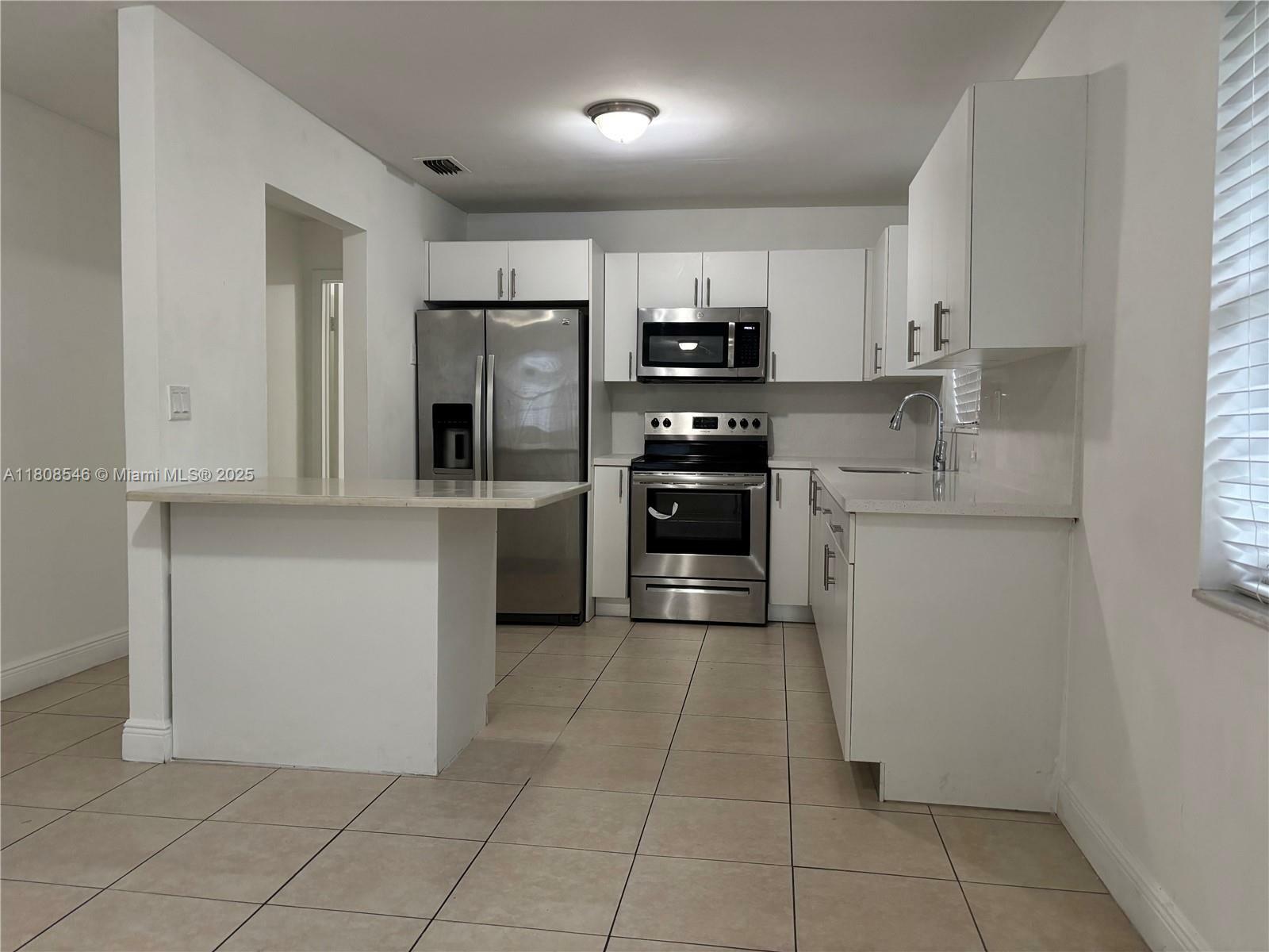 Property Photo: 5130 NW 2nd Ter 5132 FL 33126