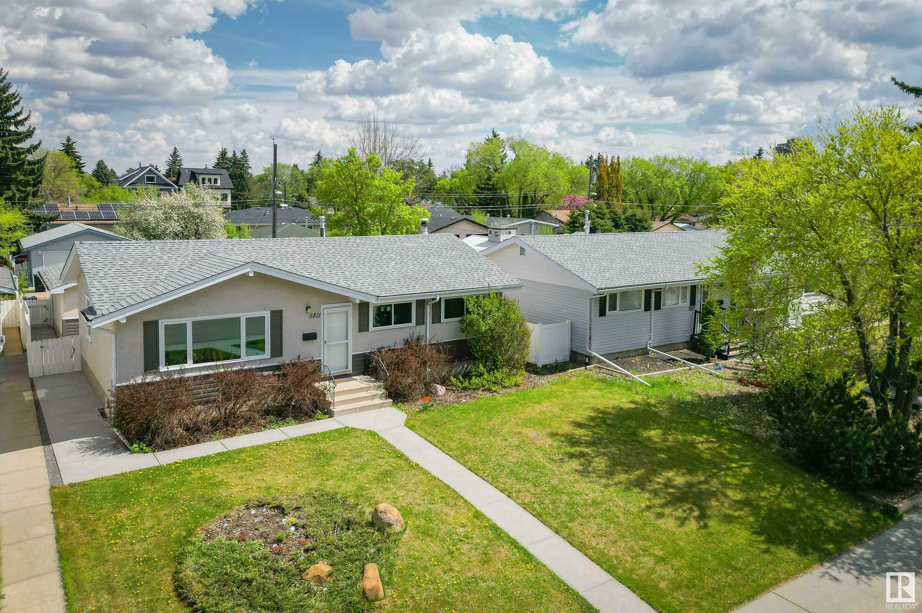 Property Photo: 5811 113B Street NW AB T6H 3J4