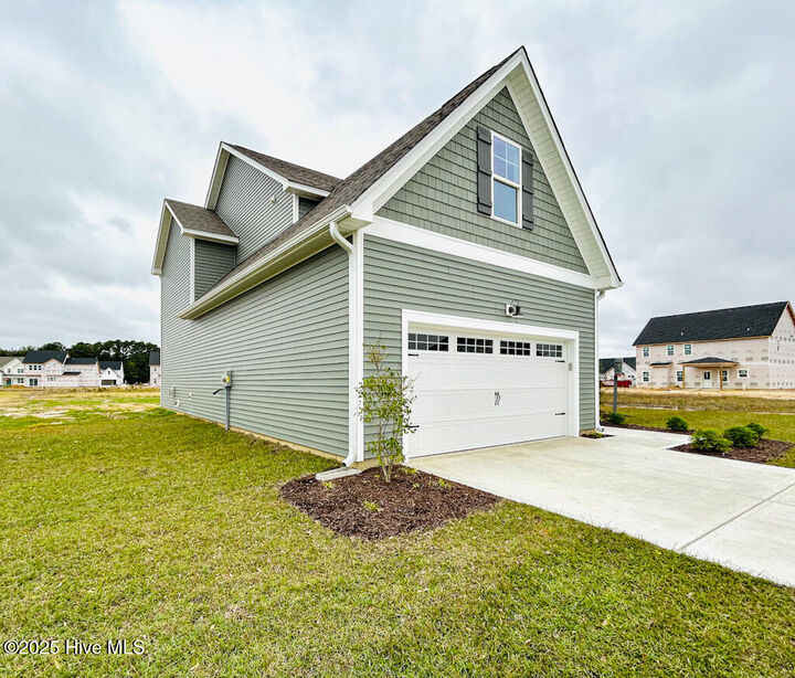 Property Photo:  802 Tupelo Tree Drive  NC 28539 