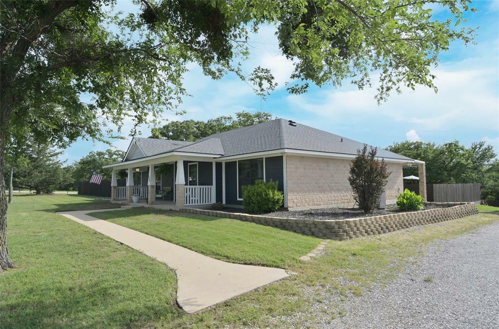 Property Photo: 228 County Road 3385 TX 76073