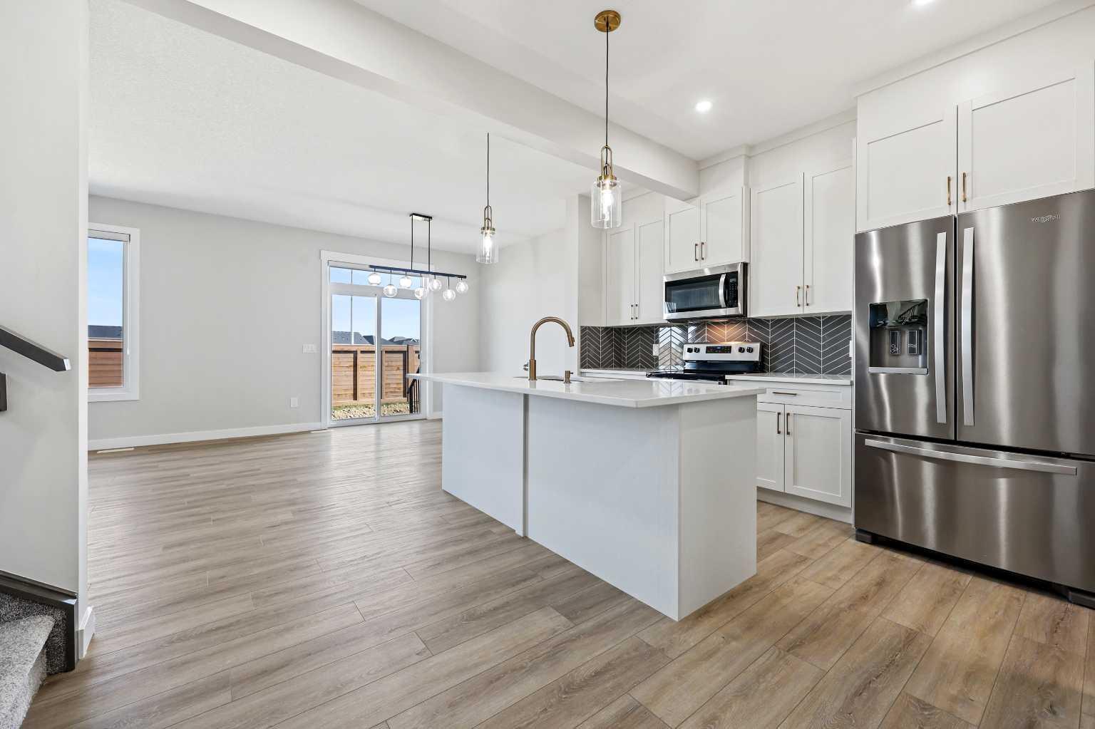 Property Photo: 592 Savanna Crescent NE AB T3J 5P1