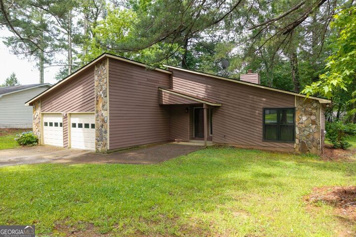 Property Photo:  9383 Woodknoll Way  GA 30238 