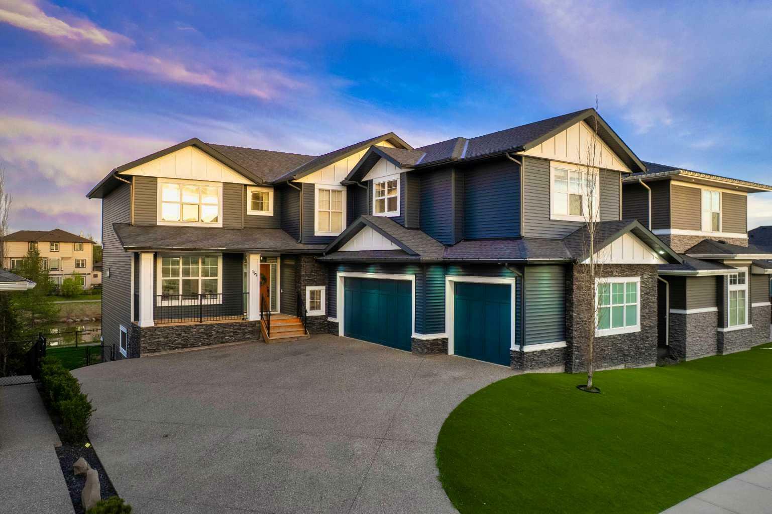 Property Photo: 162 Canoe Crescent SW AB T4B 2N9