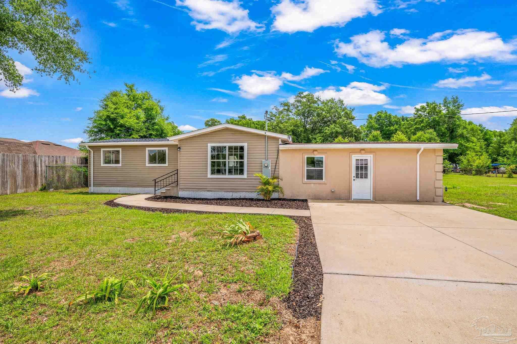 Property Photo: 6998 Cosmos St FL 32570