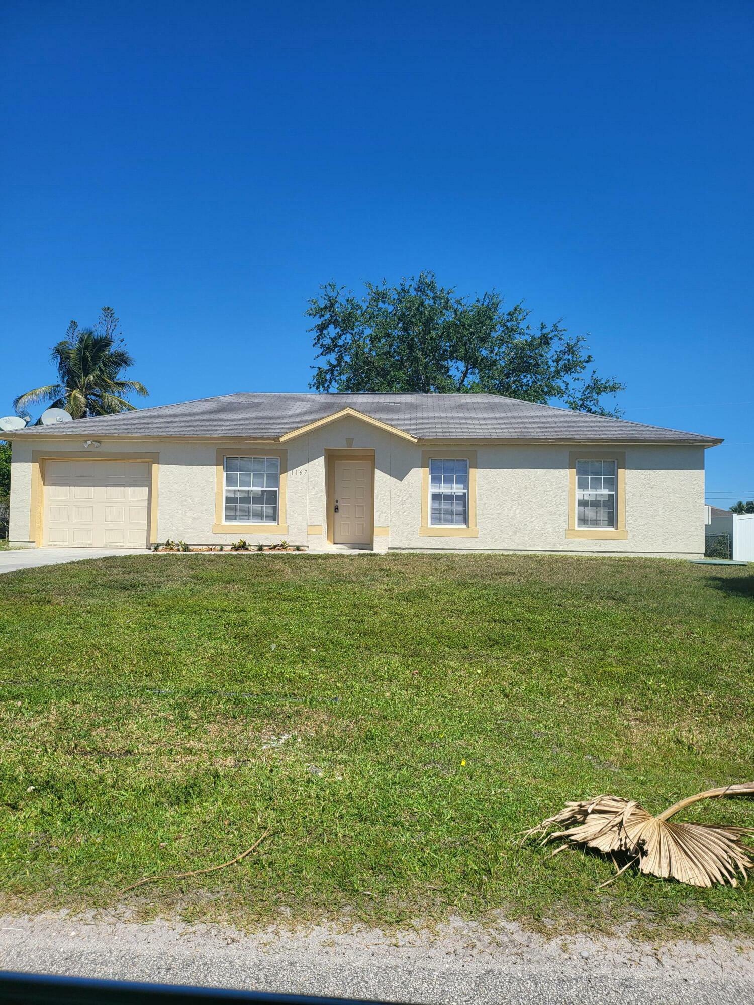 Property Photo: 1167 SW Curtis Street FL 34983