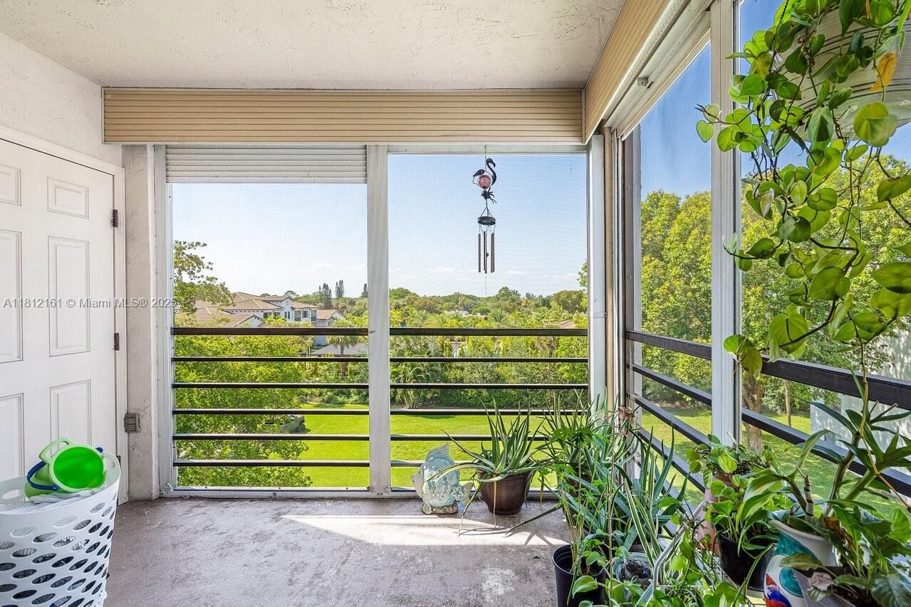Property Photo:  9235 SW 8th St 502  FL 33428 