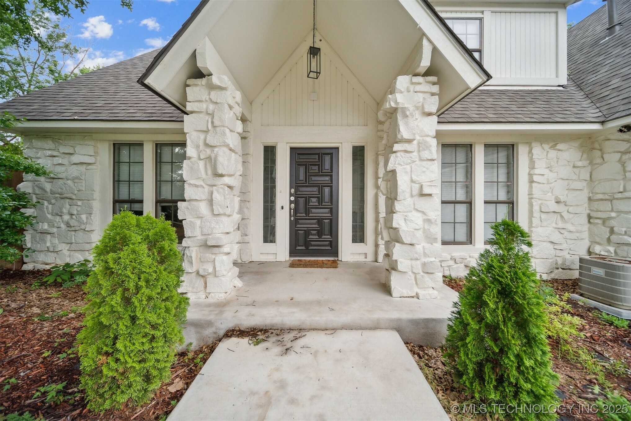 Property Photo: 11033 E 66th Street OK 74133