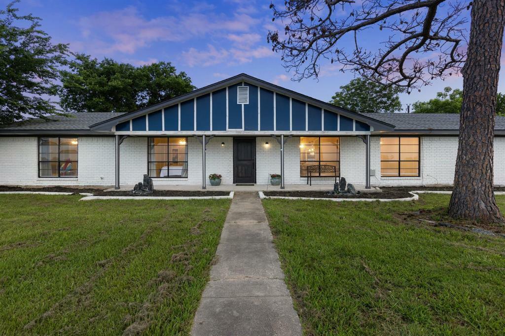 Property Photo: 713 W Rosemary Street TX 75474