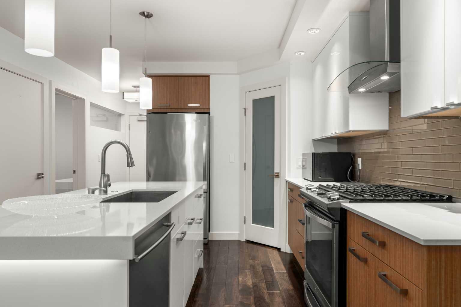 Property Photo: 1029 15 Avenue SW 302 AB T2R 0S5