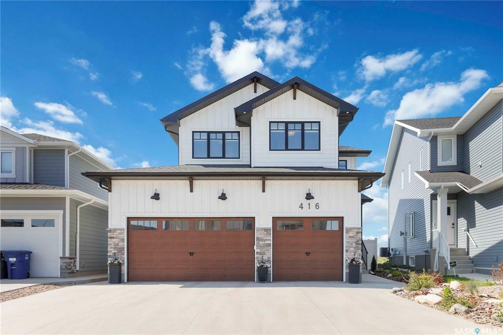 Property Photo: 416 Woolf Bend SK S7W 1E5